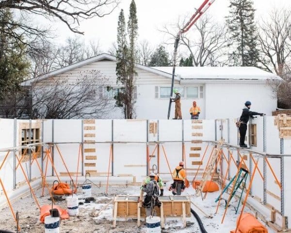 The crew is filling the Logix ICF (predecessor of Element ICF) with concrete.