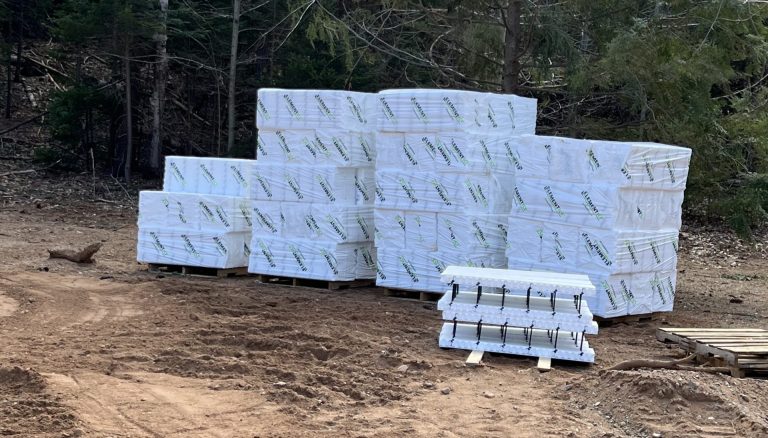 A load of Preformed Element ICF blocks at a job site.