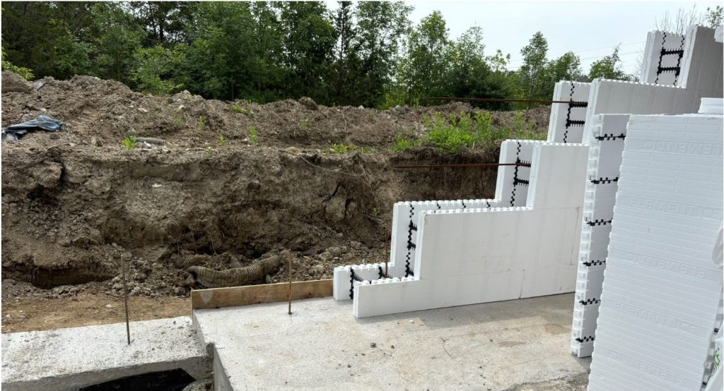 A Half height 8" block on the bottom of the 1st row of Element ICF Blocks