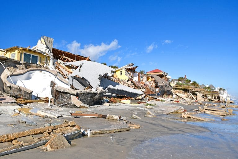 Oceanfront homes and seawalls heavily damaged during Hurricane Nicole and Ian in Daytona Beach area of Volusia County, Florida