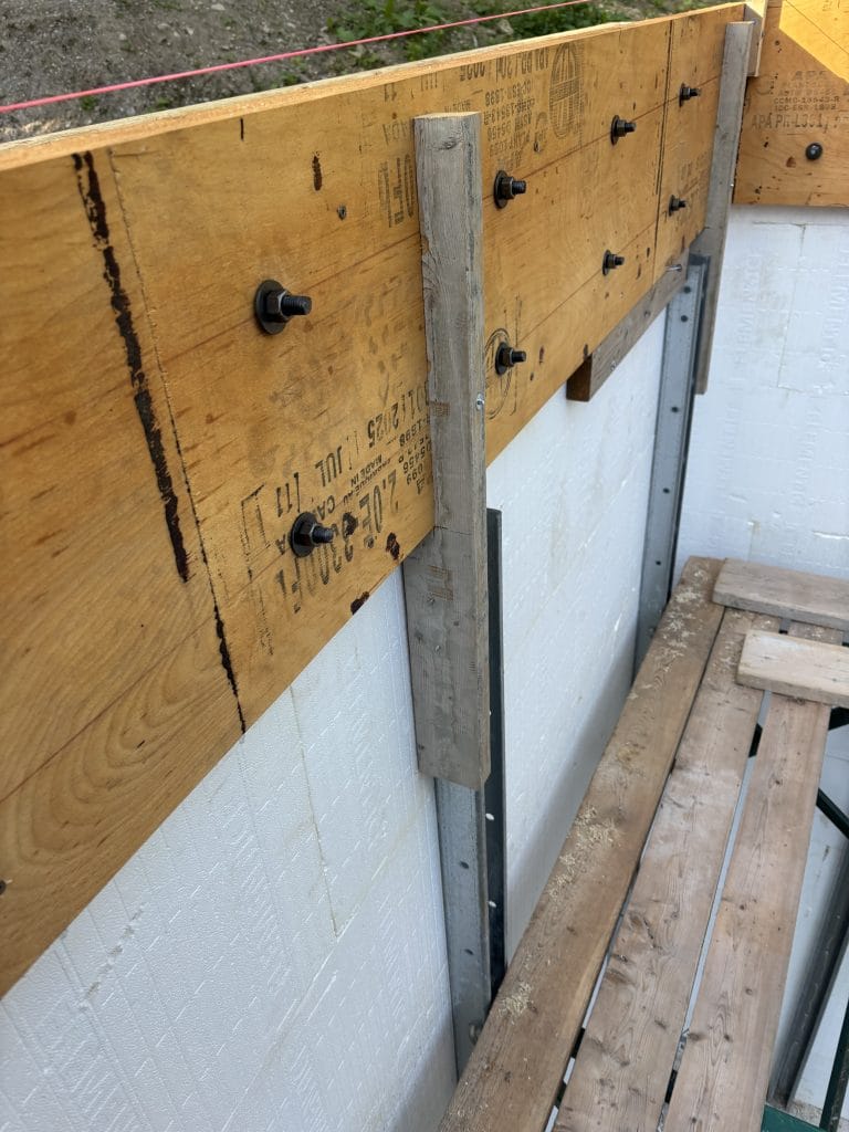 Rim joists perfectly aligned and supported by the bracing system.