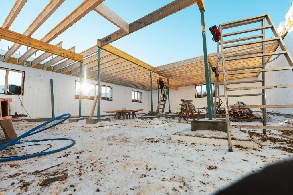 Floor system tied into the ICF walls. Simpson Strong-Tie connectors were used to attach the floor assembly while maintaining structural continuity.