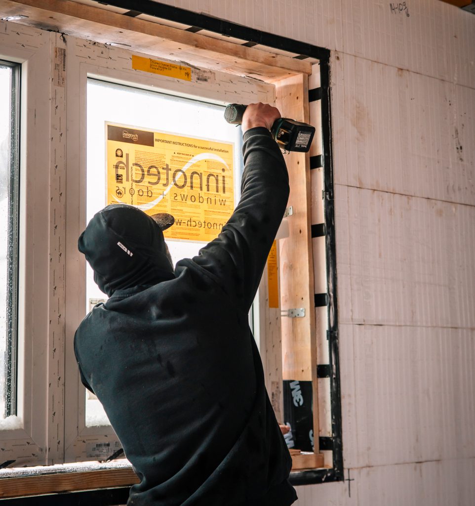 Windows installed mid-wall within the ICF assembly. Placement was driven by energy modeling to optimize thermal performance and reduce thermal bridging.