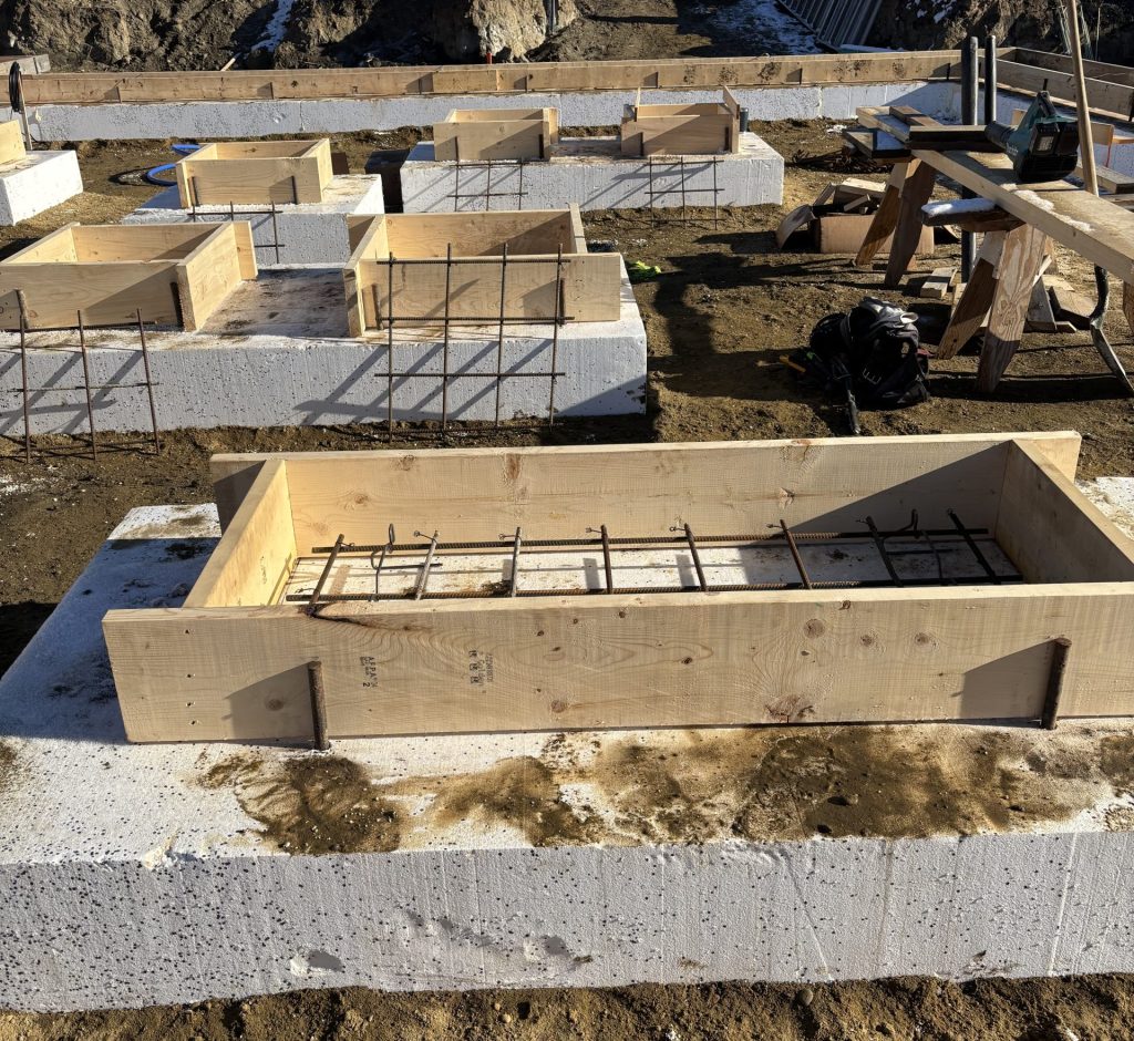 Performance Starts Below the Pour. Twelve inches of high-strength EPS beneath the footing — delivering structural support with built-in thermal separation from the ground up.