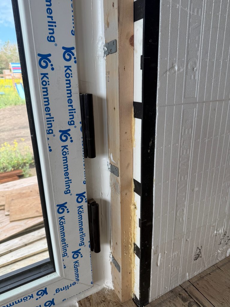 nterior profile of the window installation showing the connection between the window frame and wood subframe. Backer rod and sealant complete the air seal at the interior joint.