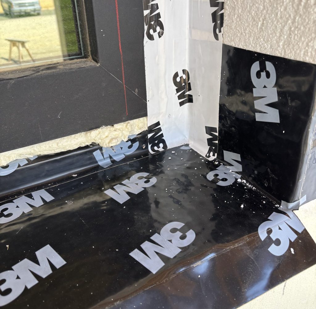 High-performance tape seals the window opening and ties it into the WRB, creating a continuous water-shedding layer that directs moisture safely to the exterior.