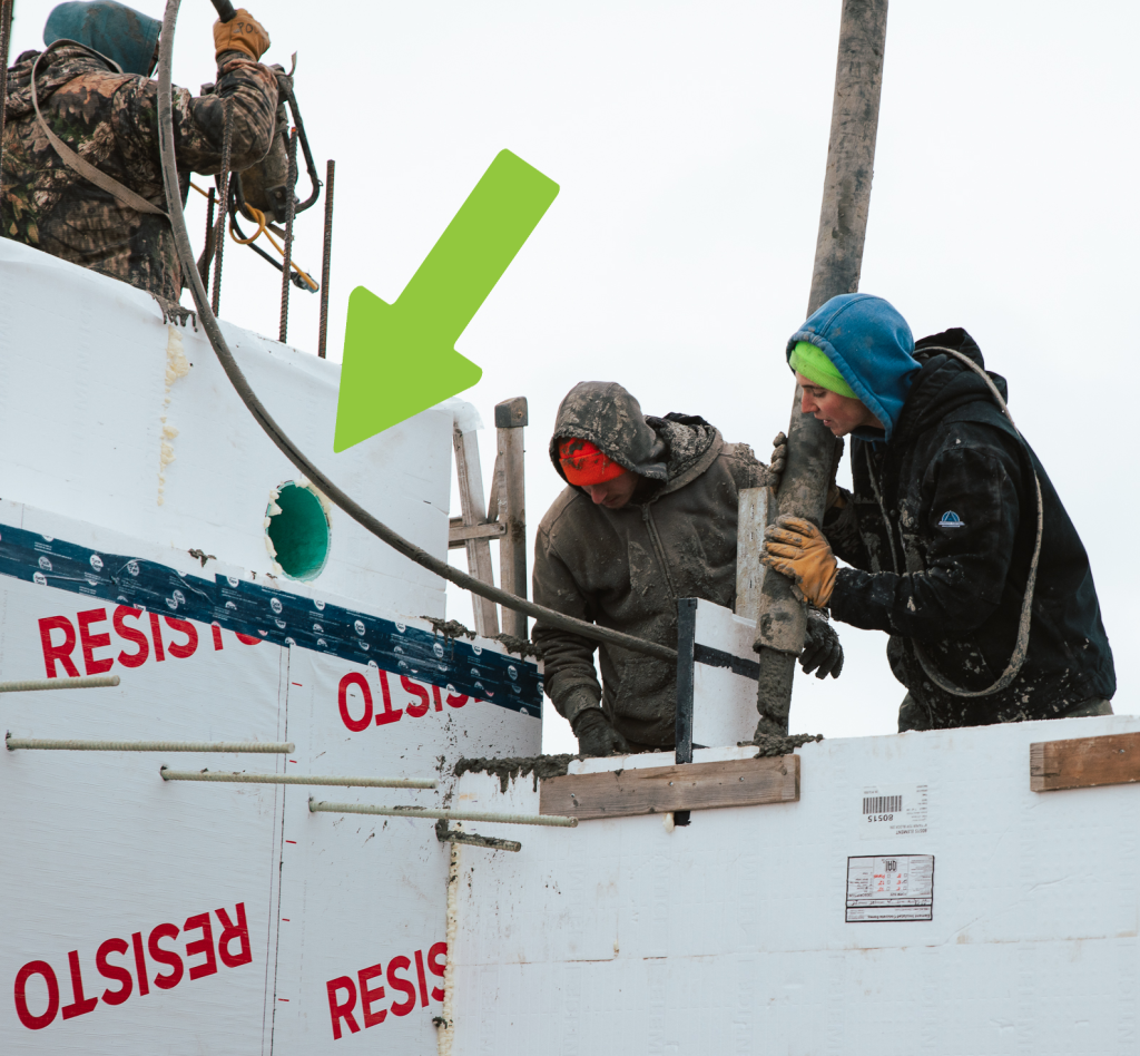 A sleeve installed through the ICF wall allows services to pass through while protecting the integrity of the air barrier.