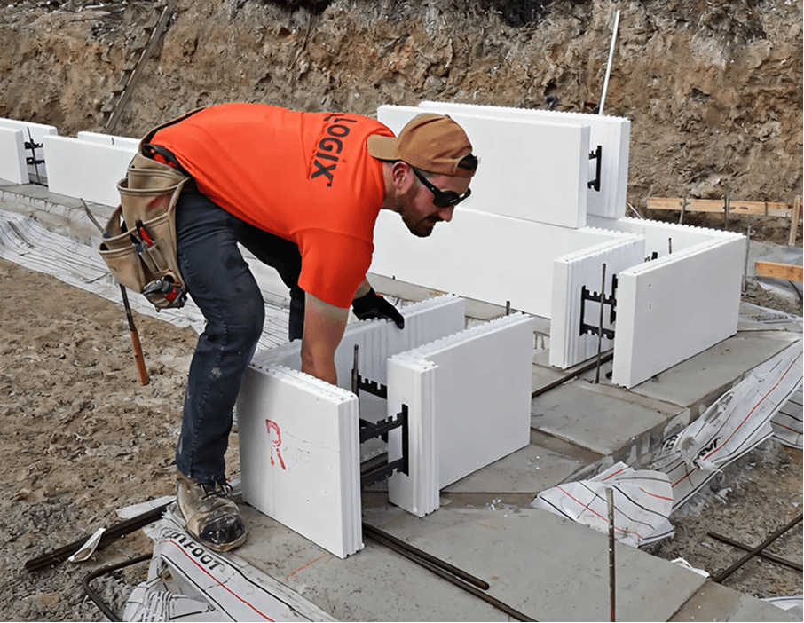 Installer placing the first course of Element ICF blocks