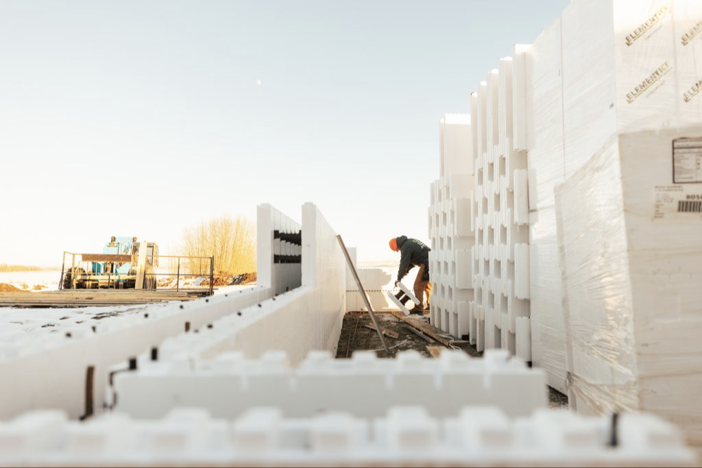 Dennis Borren standing inside a Passive House ICF build